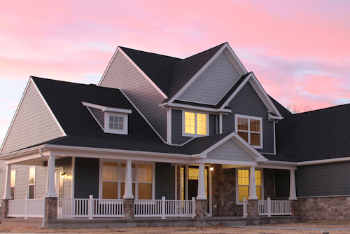 Shot of Craftsman style home at sunset in pennsylvania built by Rotell(e) Studio(e)