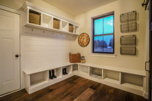 Mud room in the modern farmhouse with places to sit and store things