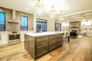 Kitchen With Island and Overhead Lighting